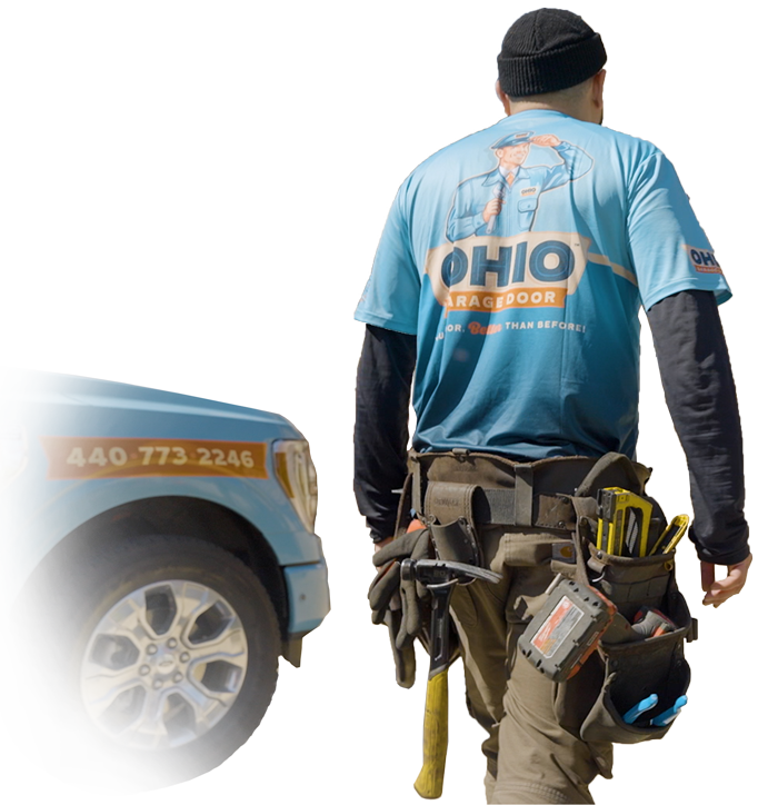 Max, the Ohio Garage Door Repair technician is walking away from camera